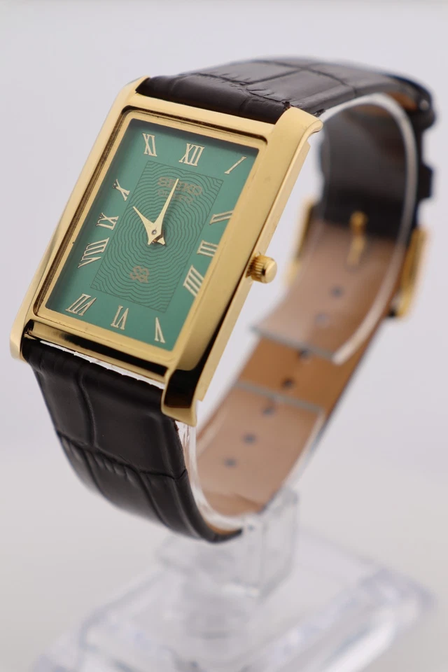 Reloj de pulsera vintage Seiko delgado de cuarzo con esfera verde para hombre con correa marrón oscuro Foto 3 de 4