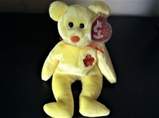 NWT TY Beanie Baby BUNGA RAYA Yellow Teddy Bear Malaysia Exclusive 2002 Retired