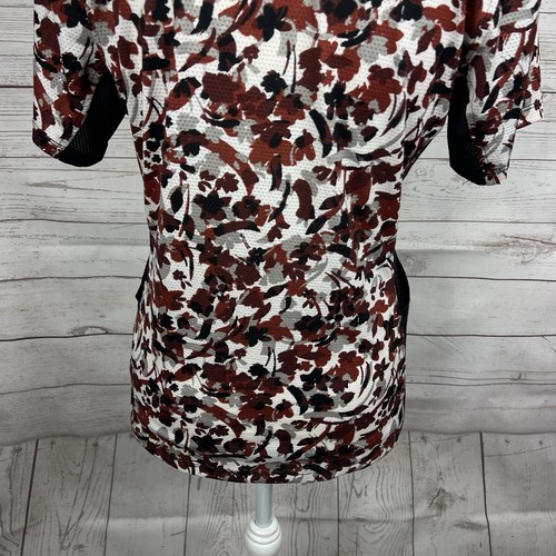 Camisa de montar Kerrits para mujer Ice Fil 1/4 cremallera talla pequeña floral manga corta - Imagen 7 de 9