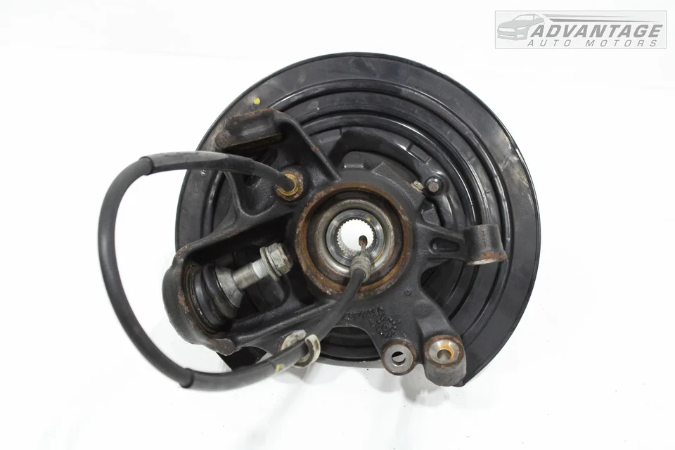 Dodge Durango 2016-2025 eje trasero izquierdo nudillo rueda buje OEM Foto 2 de 4