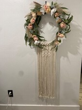 Macram  Boho pastel colored flowered wreath. Measures 58 inches in length
