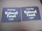 Vintage National Forest Entering Leaving signs