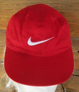 white nike hat with red swoosh