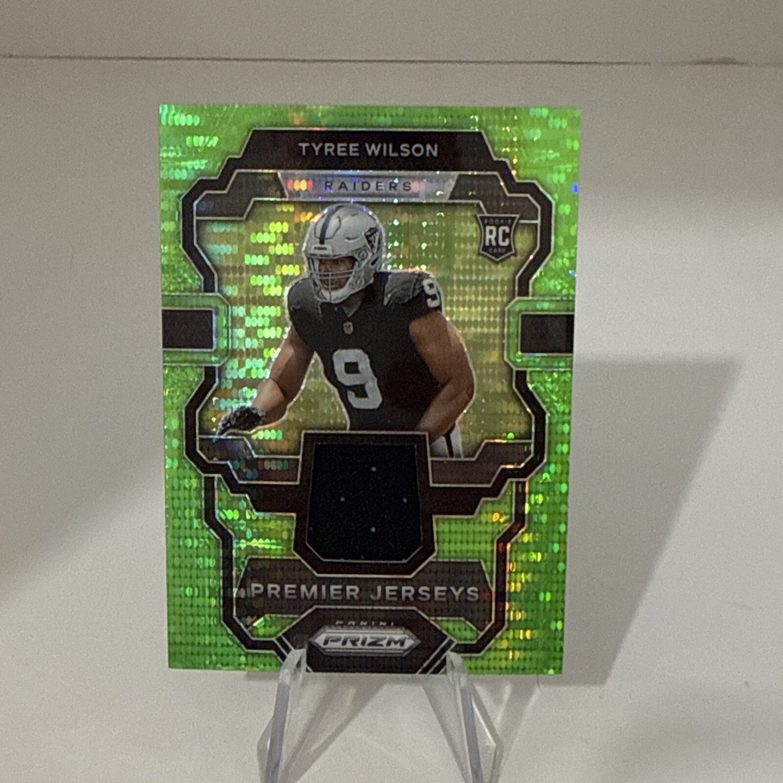 2023 Prizm - Premier Jerseys Neon Green Pulsar Prizm #PJ-TW Tyree Wilson