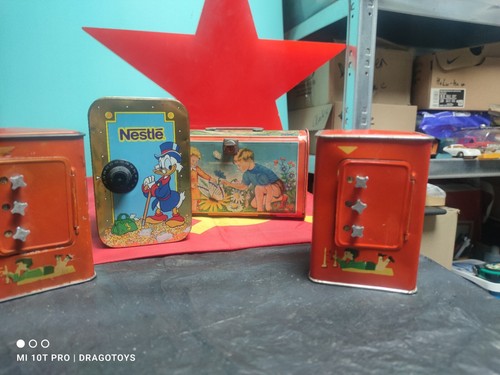 VINTAGE NESTLE DISNEY LATTA GIOCATTOLO MONETA BANCA DENARO COMBINAZIONE CASSAFORTE ZIO SCROOGE - Foto 11 di 24