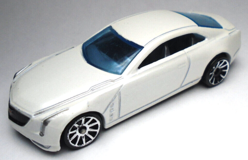 2014 HOT WHEELS CADILLAC ELMIRAJ WHITE 1:64 DIECAST 3 1/8" CAR WITH BLUE WINDOWS
