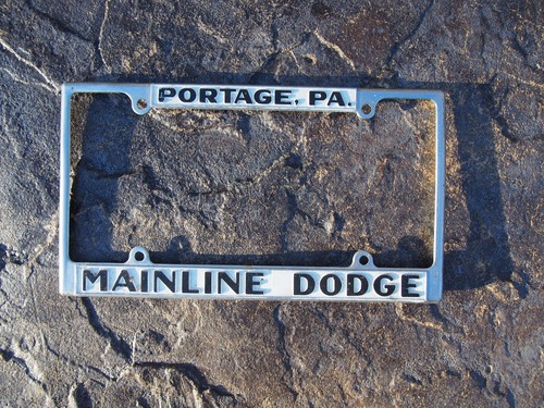 Vintage MAINLINE Dodge Dealer Metal Embossed License Plate Frame Portage Pa - Picture 1 of 16