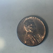 1956-D 1C RD Lincoln Cent We Out of Alignment. Date Curved