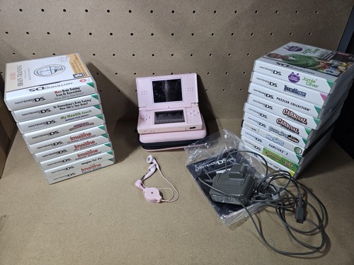 Nintendo DS Lite Pink Handheld Console Damaged but still working With 19 Games