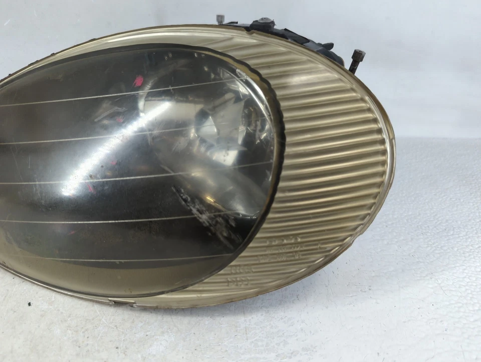 Faro delantero izquierdo Ford Taurus 1998-1998 conductor OEM BSCRG Foto 4 de 4