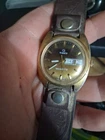 Vintage Gold Tone Timex Q Quartz Dual England Day and Date Men's Wrist Watch