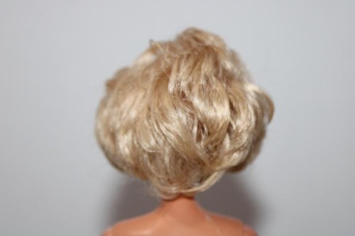 Muñeca desnuda Mattel Twist n' Turn TNT pelo corto rubio China seminueva - Imagen 8 de 10