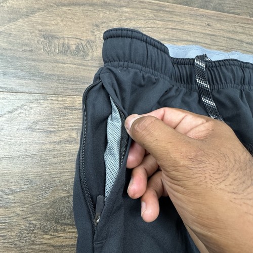 Pantalones deportivos Nike North Carolina Tar Heels para mujer medianos negros emitidos por el equipo de la NCAA - Imagen 7 de 12