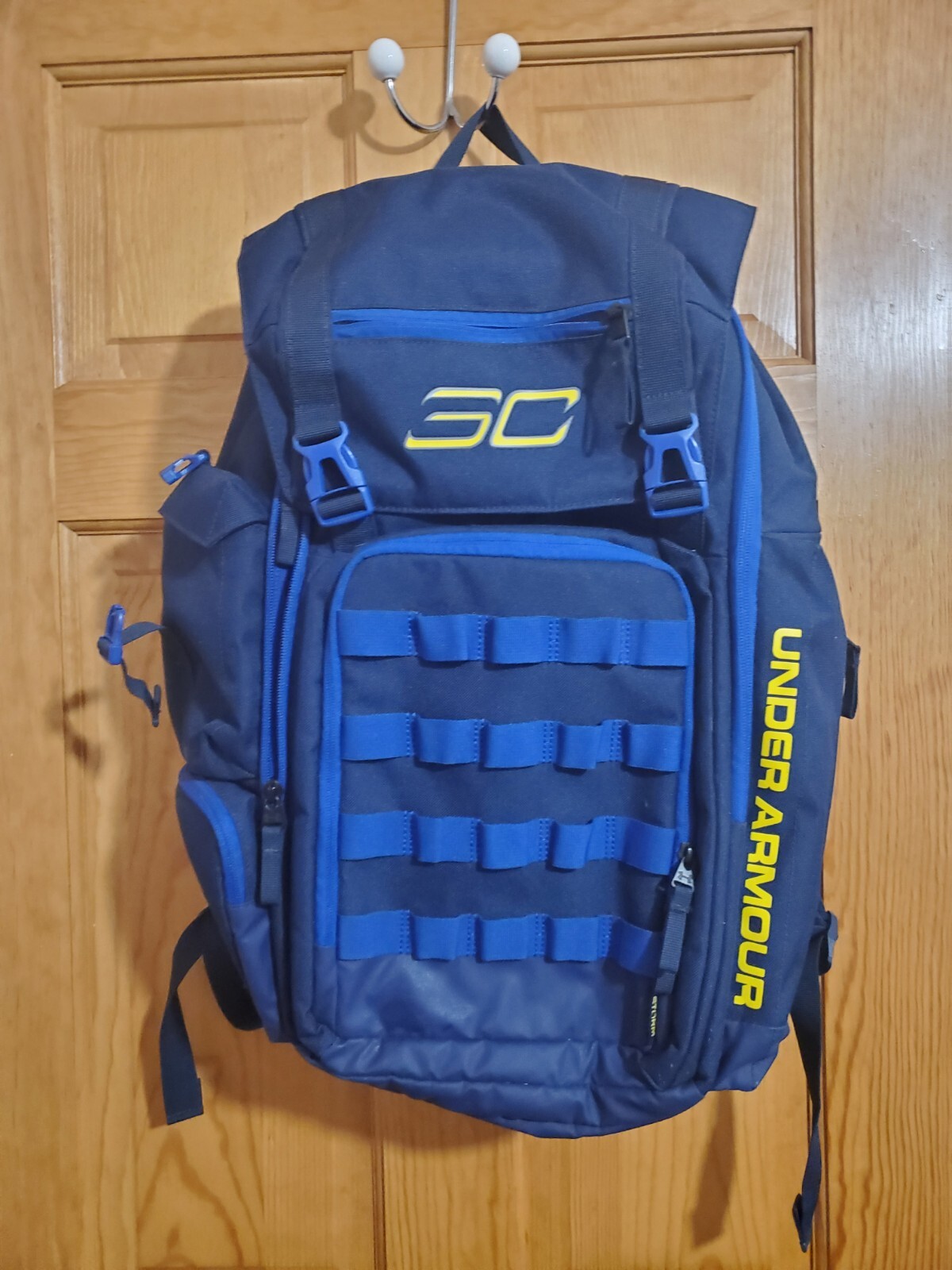 blue and yellow under armour backpack