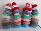 HAND KNITTED EGG COSY/COSIES  SMALL HATS SET OF 4.