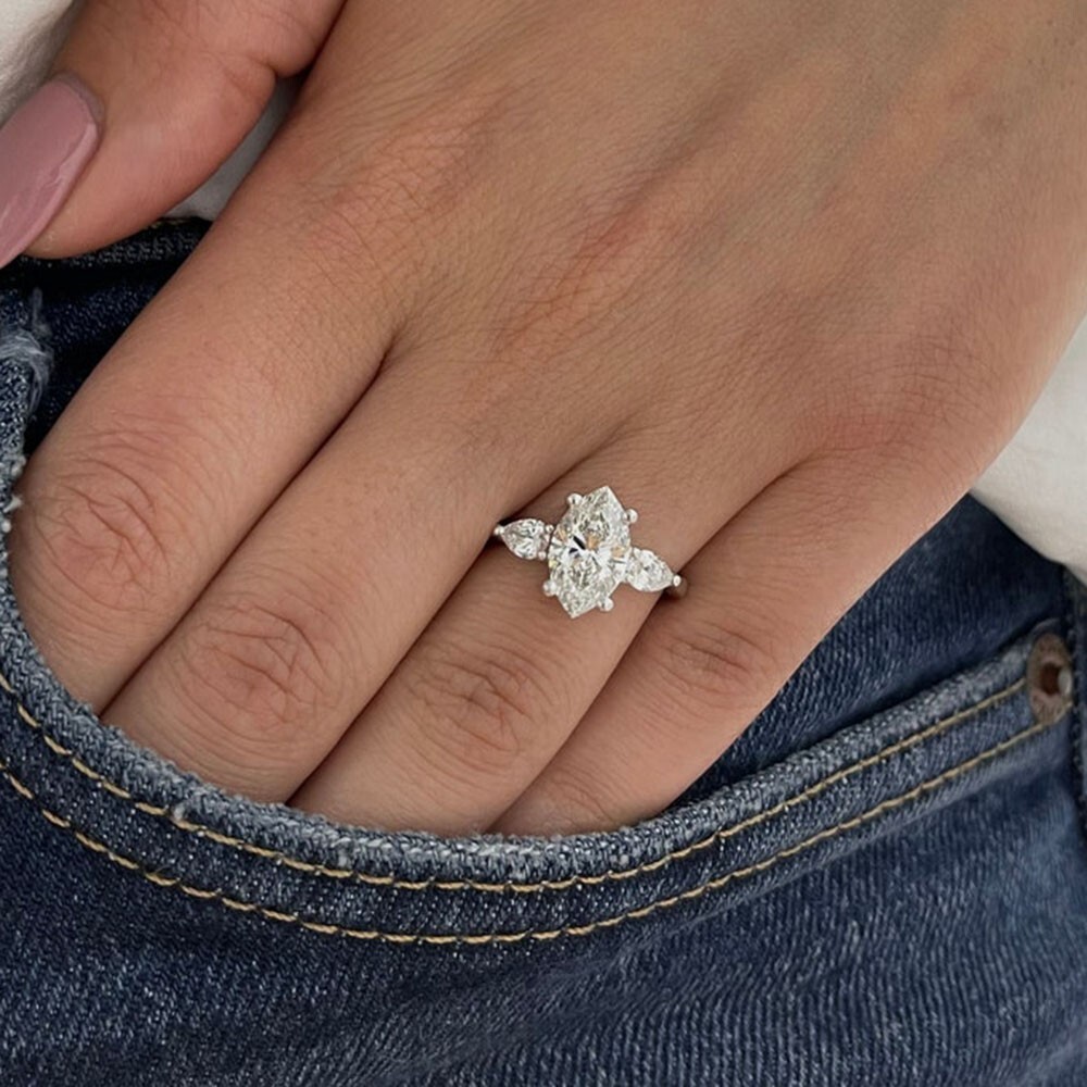 Marquise 3 shop stone engagement ring