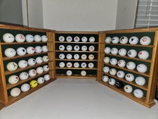 3 Golf Ball Wooden Display Shelves, Comes With 72 Balls. Each Shelf Holds 25.