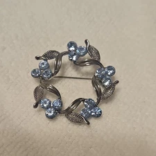 Silver Tone Leaf Flower Wreath Brooch Light Blue Rhinestone Unmarked Jewelry Pin