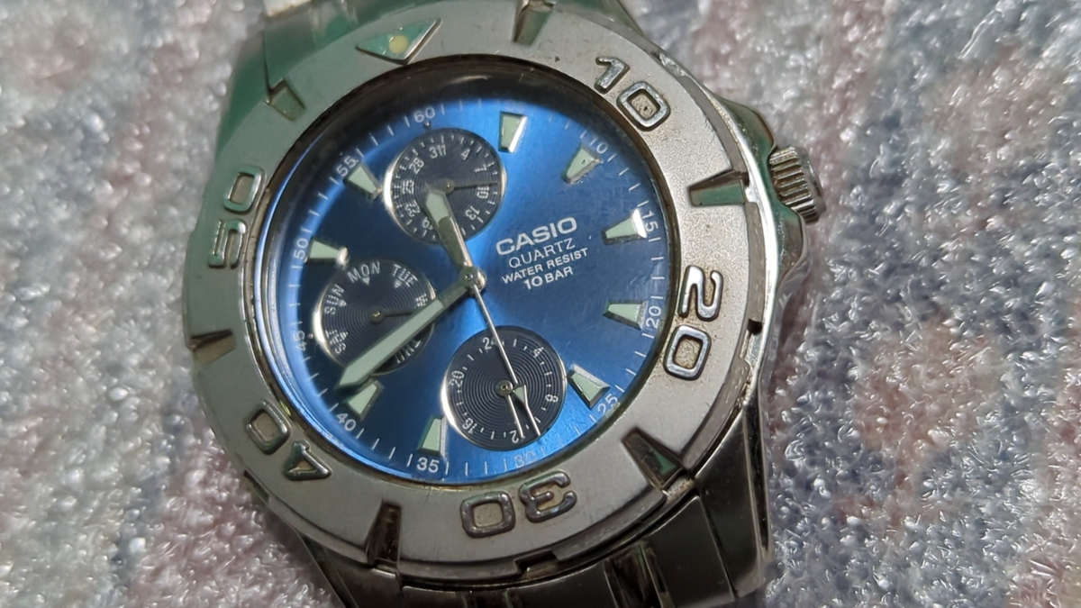 CASIO MTD-1047 Quartz Watch with Rotating Bezel and Blue Dial for 