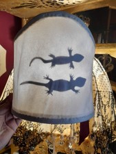 Ventola design artigianale sagome coppia gechi controluce poetica portafortuna