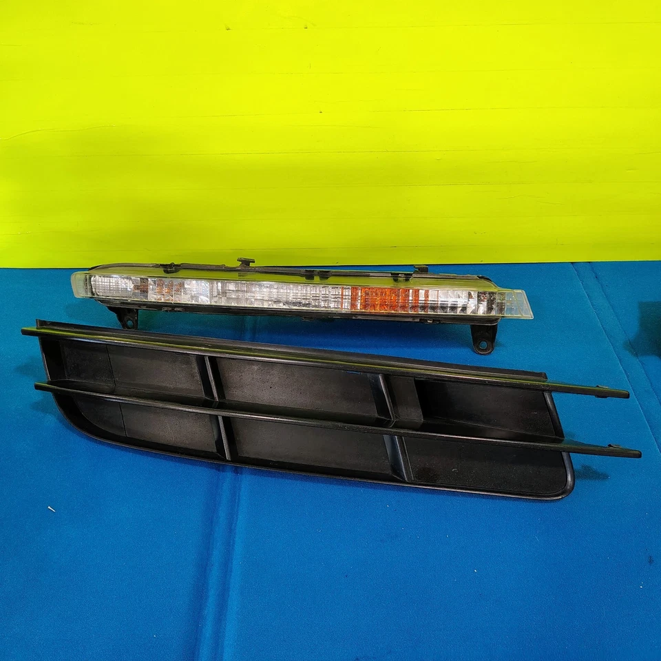 AUDI Q7 2007-2009 - Luz de giro del parachoques delantero derecho izquierdo con moldura/moldura OEM Foto 3 de 4