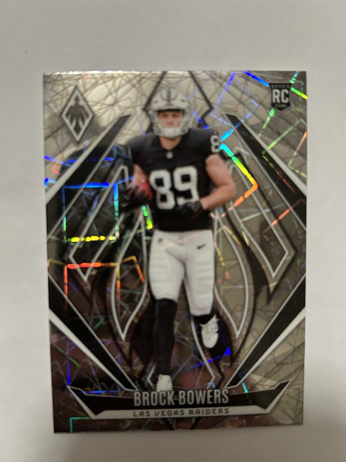 2024 Panini Phoenix - Rookies Brock Bowers #165 Lazer (RC)