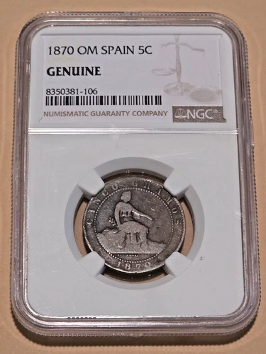 1870 OM Spain 5 Centimos - NGC Genuine - Bronze Seated Hispania Coin