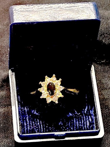 gebrauchter Vintage Ring vergoldet mit dunkelblauem Saphir