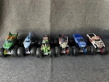 2015 Feld Motor Sports INC. Plastic Grave Digger Monster Jam Truck Lot Of 6