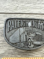 Vintage Raleigh Lights Belt Buckle Mens Pewter Semi Truck Trucker Smoking 80s