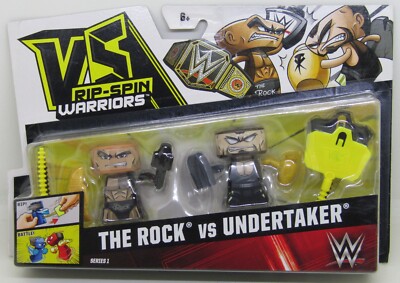 VS Rip-Spin Warriors Series 1 WWE Wrestling The Rock vs. Undertaker Mattel NEW