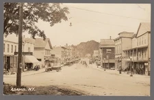 Real Photo Postcard Adams, New York Busy Street, Early Cars