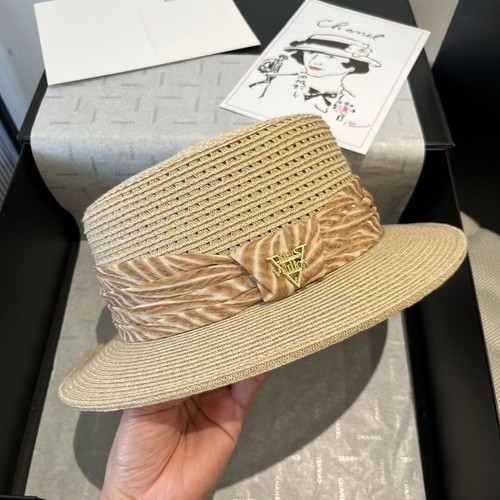Louis Vuitton gold and straw bowler hat, head circumference 57cm