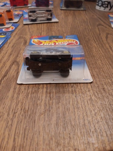 Jeep Hot Wheels #304 Roarin' Rods serie 2/4 roll patrol con radio CT amarillo - Imagen 3 de 6
