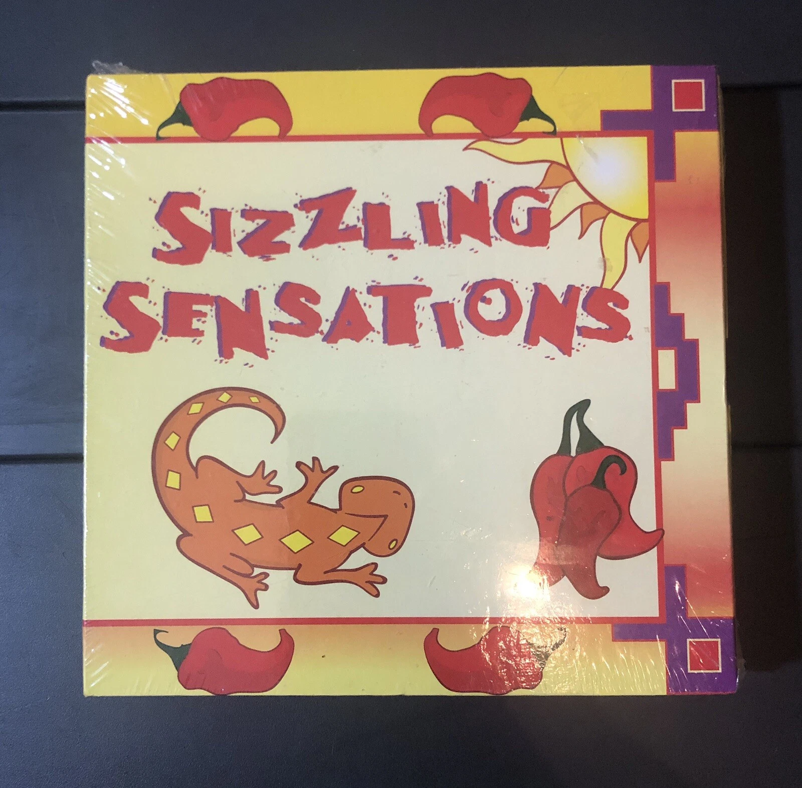 SIZZLING SENSATIONS COOKBOOKw/measuring spoons