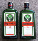 2x EMPTY JAGERMEISTER GREEN GLASS BOTTLES. SCREW TOP 700ml. 23CM TALL X 9CM WIDE