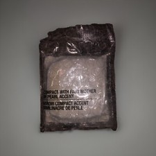 AVON COMPACT WITH FAUX MOTHER- OF- PEARL ACCENT MIRROR 