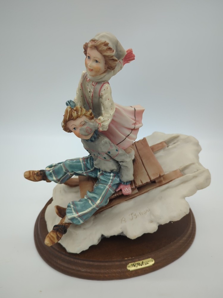Vintage A. Belcari Boy and Girl Figurine Sledding Made in Italy