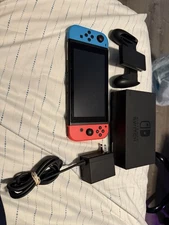 Nintendo Switch Excellent Condition With Joycons, Charger, Dock, And Rail Attach