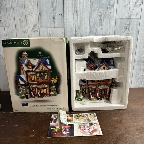 Dept 56 Scrooge McDuck & Marley's Counting House -North Pole Series - Picture 9 of 12