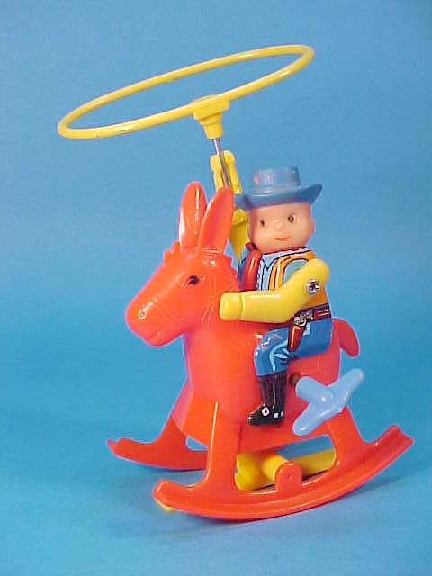 Courtland Rocking R Ranch Wind Up VINTAGE ROCKING COWBOY WITH LASSO WIND UP TIN & LASTIC TOY BOXED BOXED ...