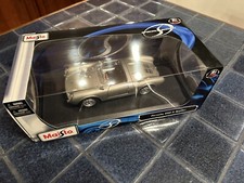 Maisto Porsche 550 A Spyder Silver 1/18 Scale Diecast No. 31843  NIB