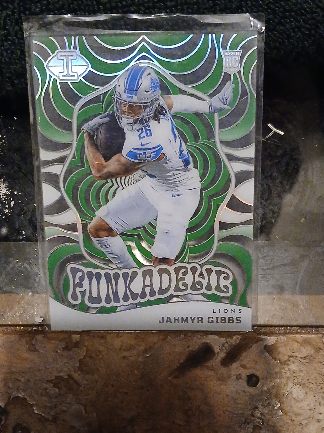 2023 Panini Illusions - Funkadelic Jahmyr Gibbs #15 Emerald (RC)
