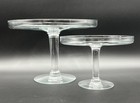 Pair Of Clear Glass Cake Or Dessert Stands 12” And 9” Wide Staggered Height