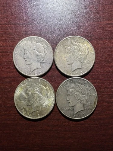 Lot of 4 Morgan Dollars (1922, 1923, 1925, 1934)