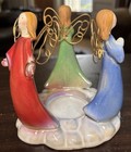 Giftco Tealight Candle Holder 3 Angels Red, Green Blue on a 5" X 4.5".