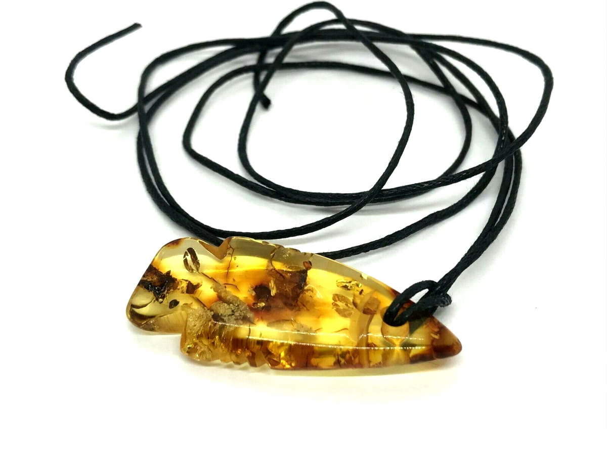 Carved amber jewelry deals