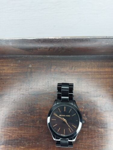Michael Kors women's Black Rhodium Plated S/S Fold Over Lock Band Quartz Watch