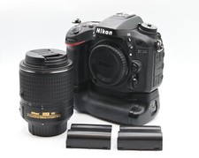 MINT Nikon D7100 Camera with Nikkor 55-200 1:4-5.6 GII ED VR and Battery Grip