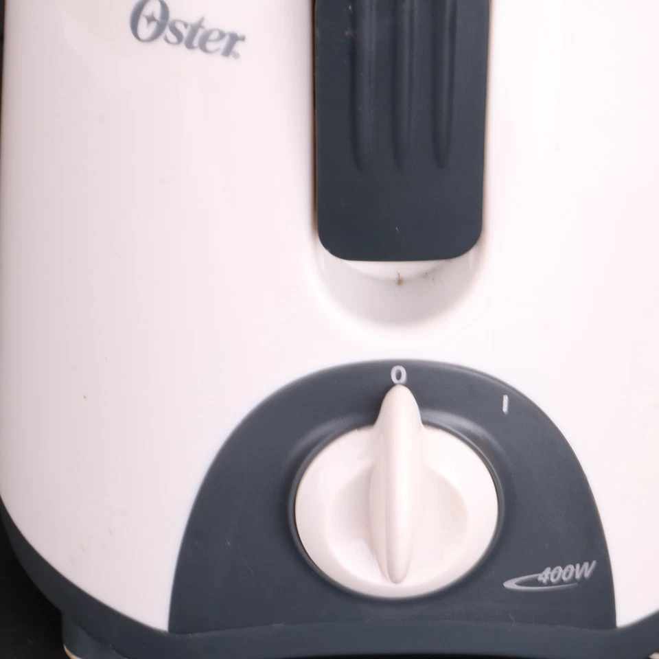 Extractor de jugo Oster 3157 que falta empujador Foto 3 de 4